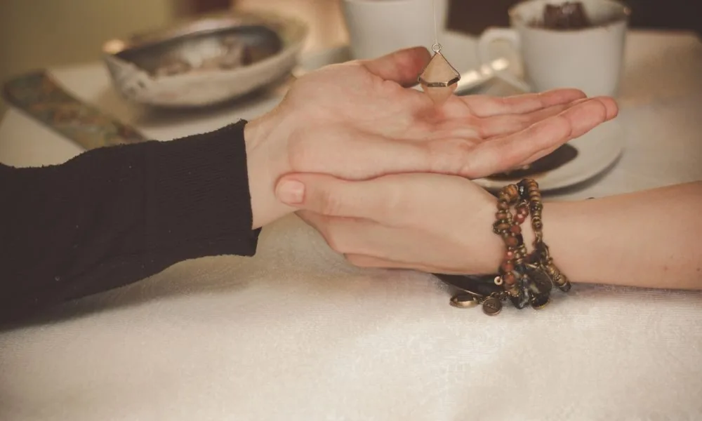 palm holding crystal