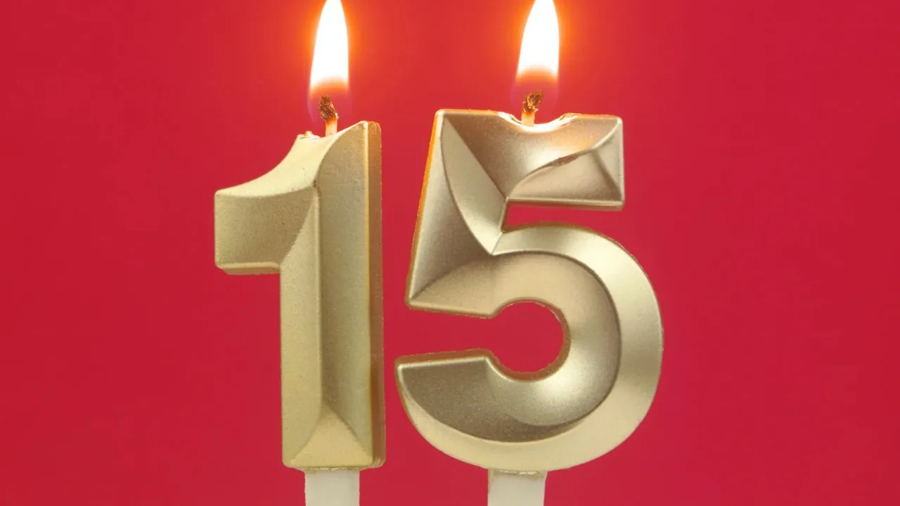 Number 15 against a red background