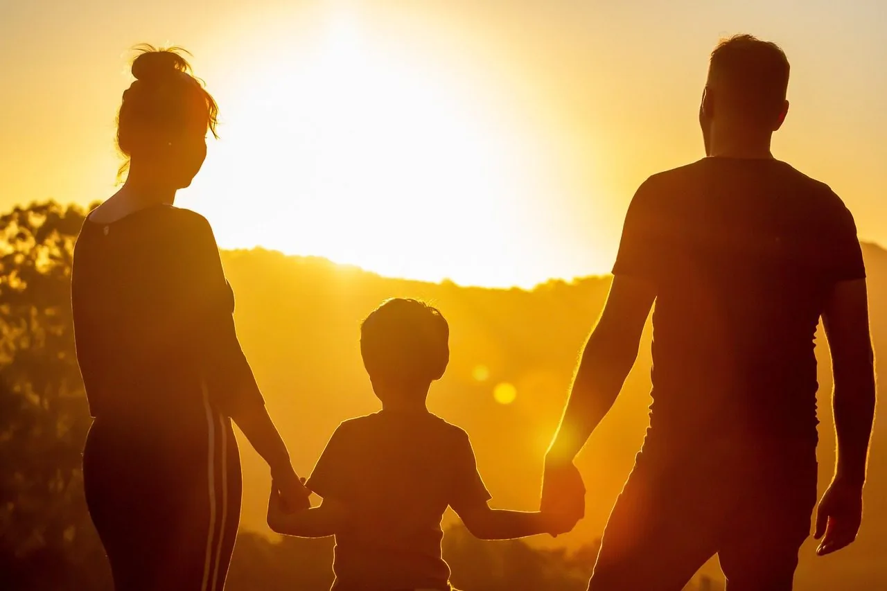 A family at sunset