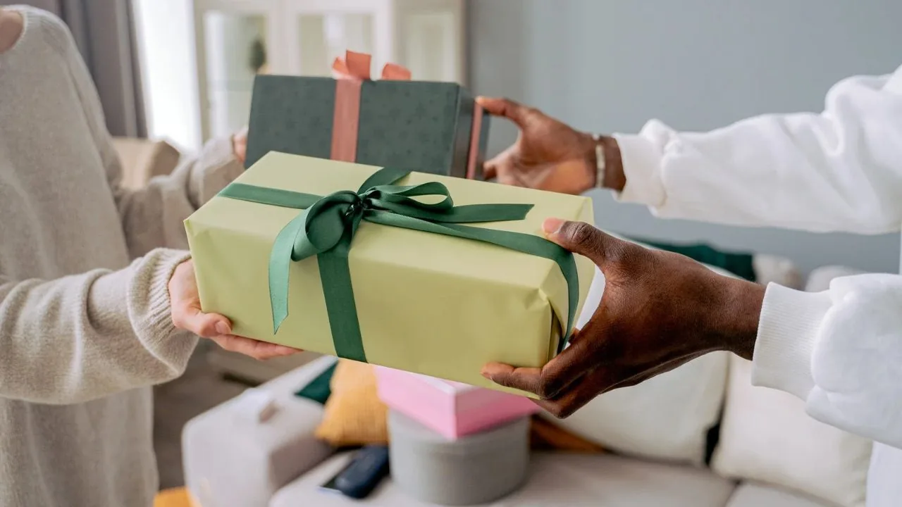Hands exchanging gifts